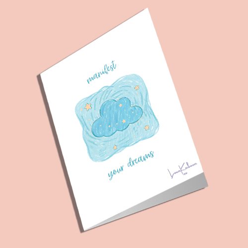 A6 rectangular card, white background and doodle cloud and stars illustration with 'manifest your dreams' in cursive font.