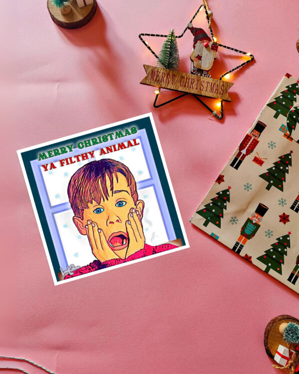 Merry Christmas Ya Filthy Animal card featuring Kevin McCallister with a surprised expression, inspired by the Home Alone movie