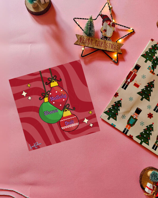 Irish Christmas card featuring colorful baubles and the greeting 'Nollaig Shona Duit'