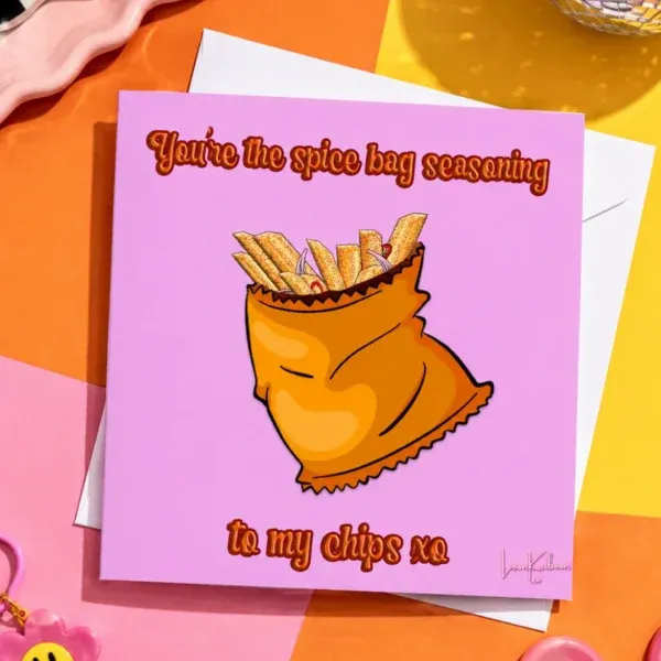 Irish Spice Bag Greeting Card flat lay on colourful table.
