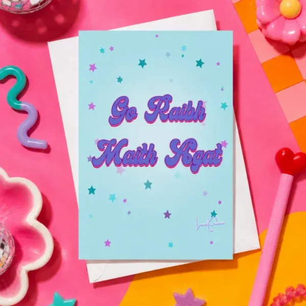 Go Raibh Maith Agat Card flat lay against funky colourful table