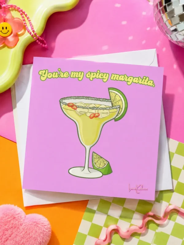You're My Spicy Margarita Greeting Card flat lay on funky table.