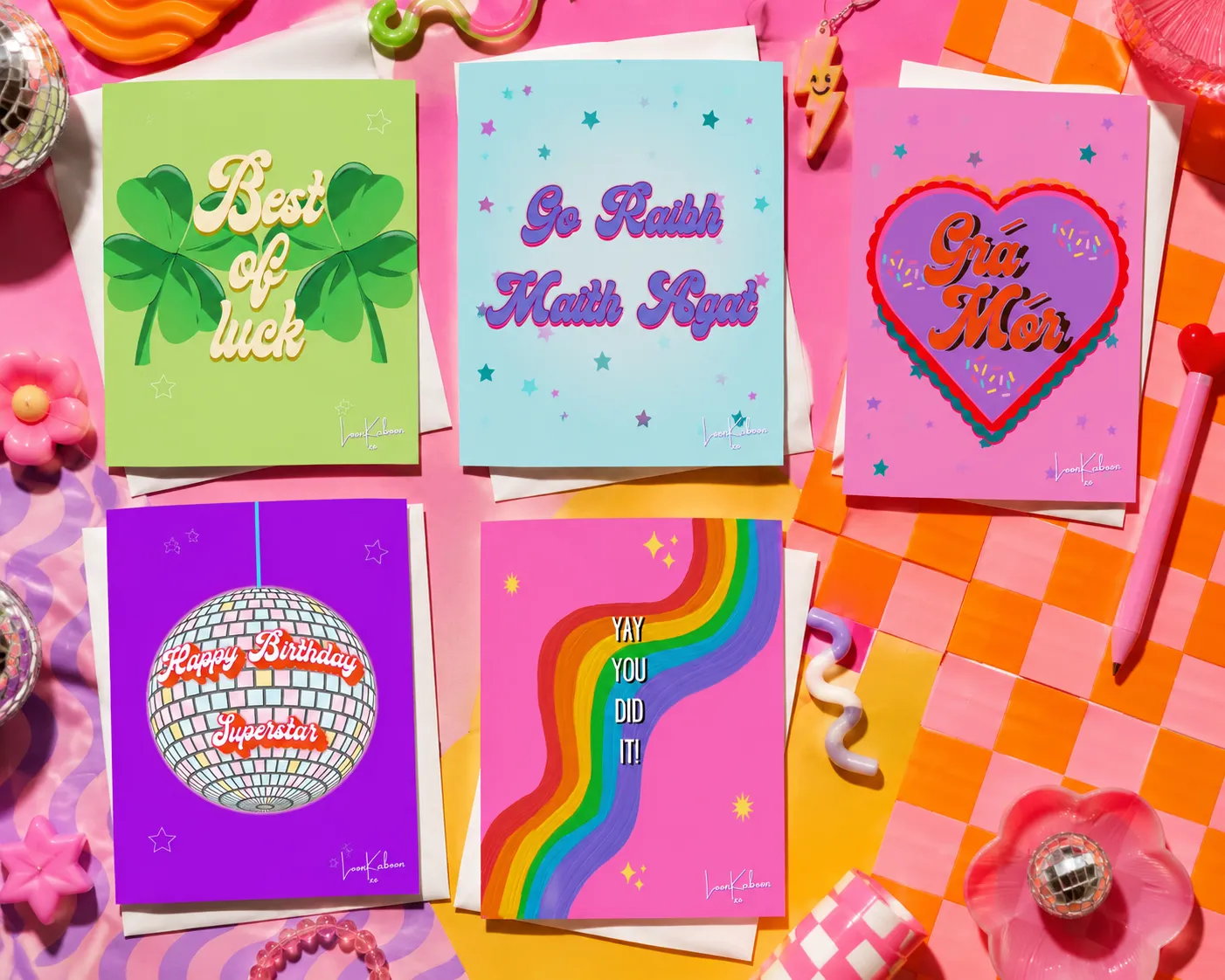 Colourful greeting card flat lay on funky background.