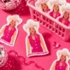 Cowboy Barbie She's Everything Sticker displayed in a cute basket and on a funky hot pink background.