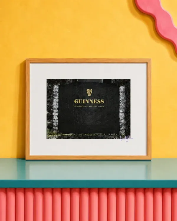 Guinness James's Gate Print framed against funky background.