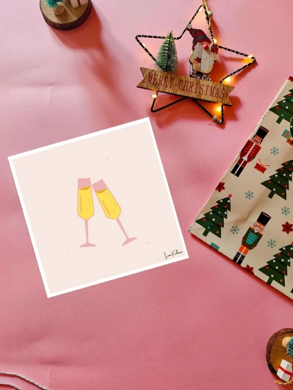 Prosecco Card Flatlay Prosecco Christmas card with two champagne glasses by Loon Kaboon